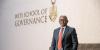 Professor Themba Maseko standing outside the Donald Gordon Building