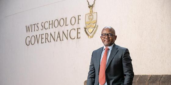 Professor Themba Maseko standing outside WSG